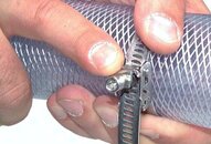 Opaska zaciskowa z zabezpieczeniem, 12mm 110 - 140mm, stal nierdzewna